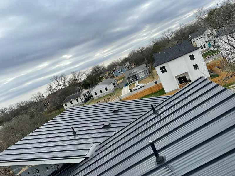 Standing seam metal roof panels with vents for Skylight Repair in Cornelius